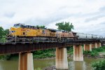 UP 6340 leads a grain train across Denton Creek
